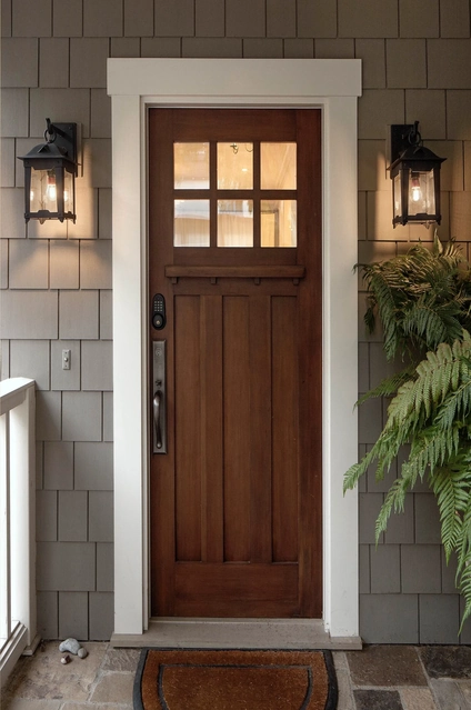 Home entrance with a wooden door