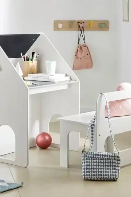 Kids furniture with colorful storage bins and shelves.