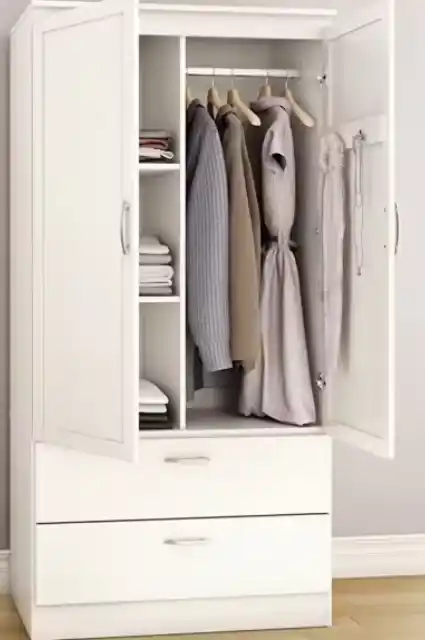 Modern wardrobe cabinet featuring sleek doors and a minimalist design.