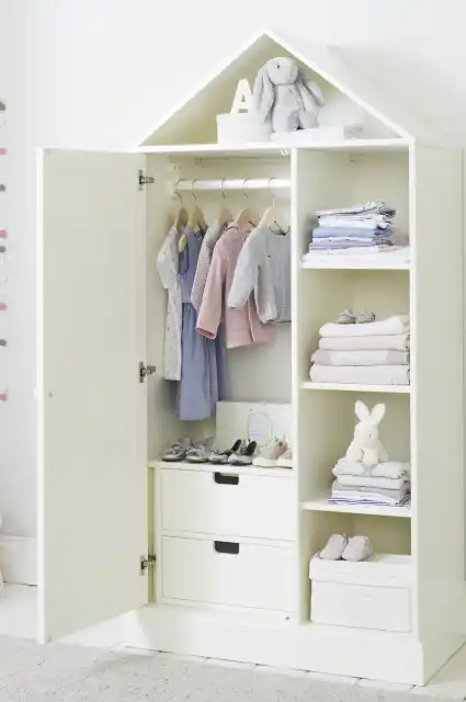 Space-saving kids wardrobe with a compact design.