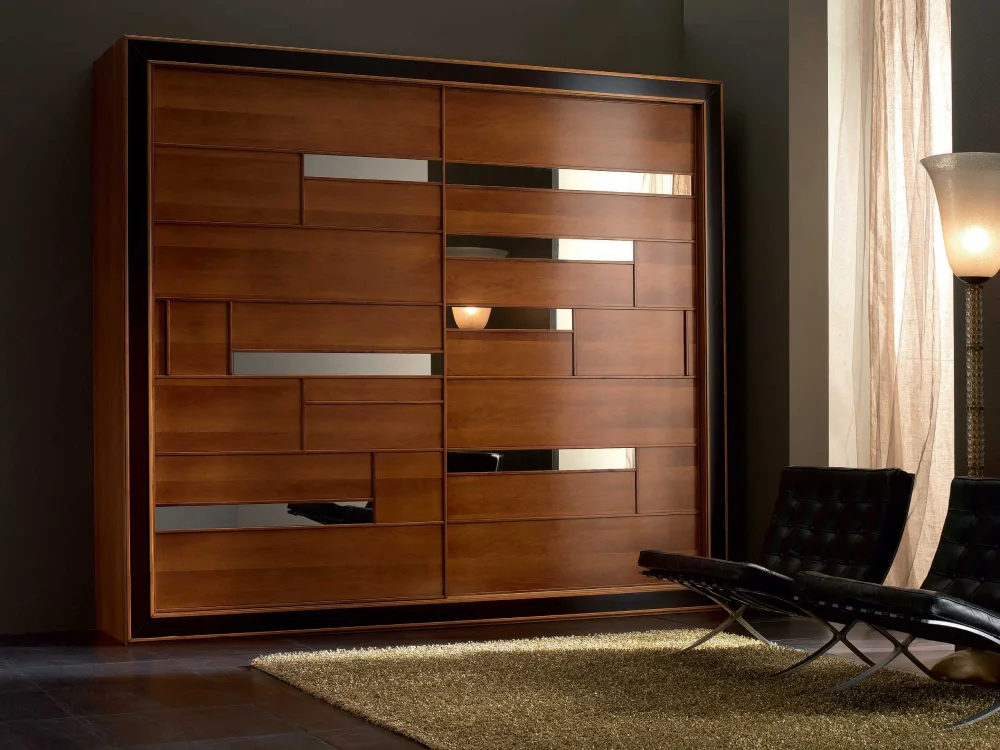 Modern wooden wardrobe with sliding doors and sleek design.