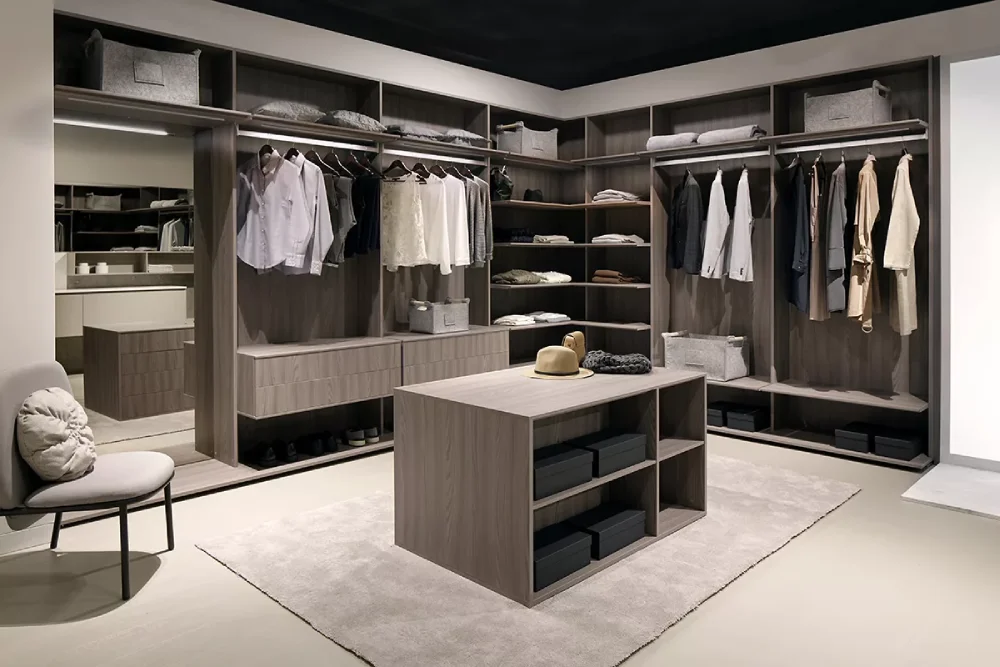 wardrobe with mirrored doors in a spacious dressing room