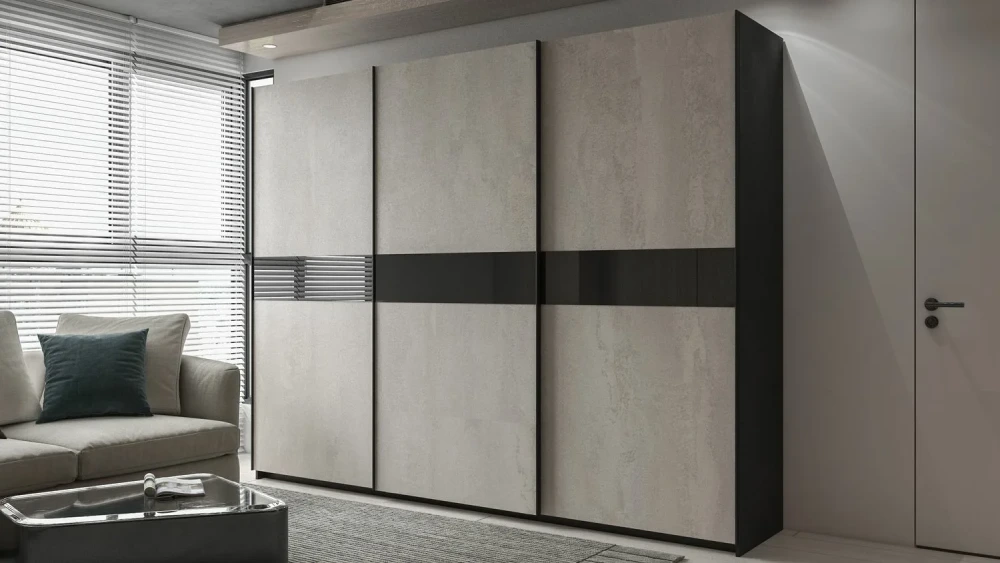 wardrobe with mirrored sliding doors in a modern bedroom.